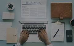 Aerial view of businessman using computer laptop